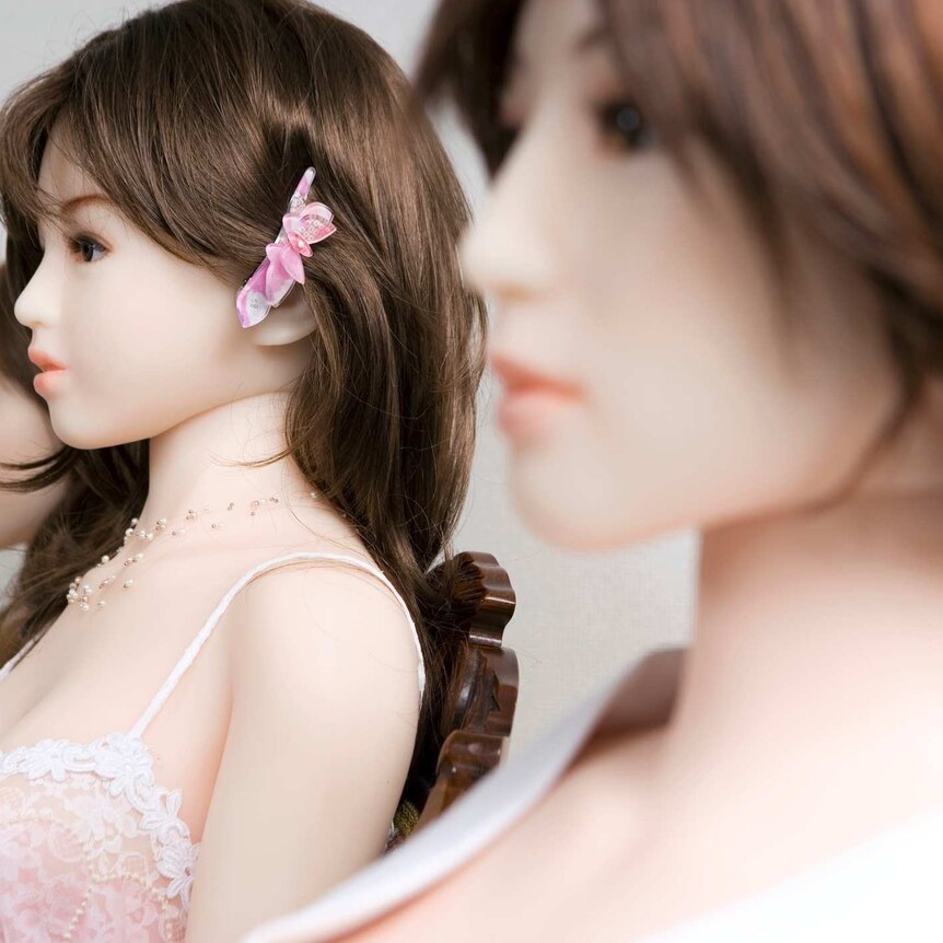 Two synthetic dolls