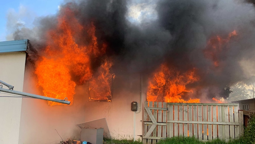 A house in Lauderdale on Hobart's eastern shore on fire, 16 September 2019