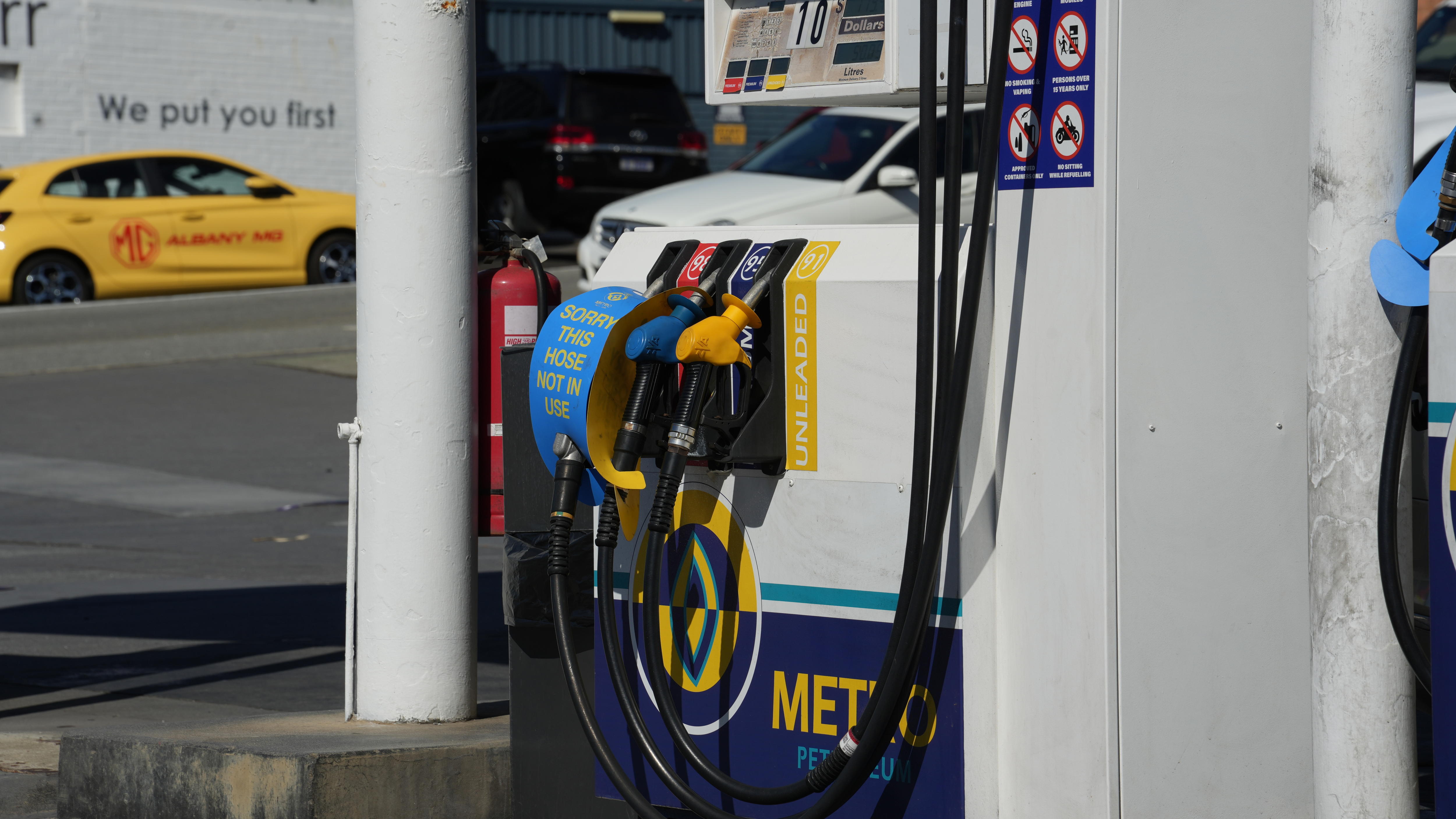 A mid-shot of a petrol bowser in Albany with a blue sign attached to the diesel pump after it ran out of diesel.