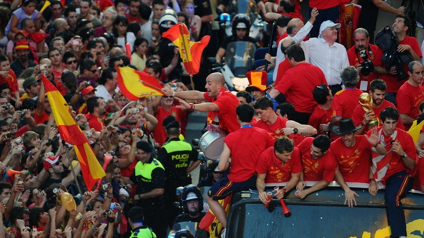 Dreams come true...the Spanish team parades past adoring fans in Madrid.