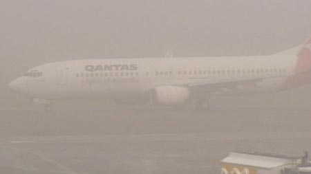 Heavy fog delays flights at Newcastle Airport.