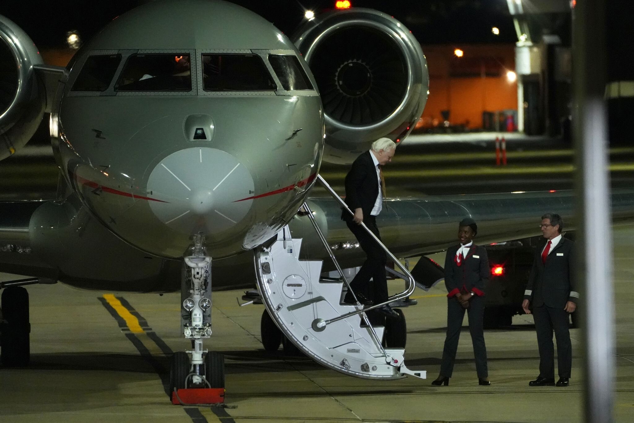 Julian Assange plane touches down