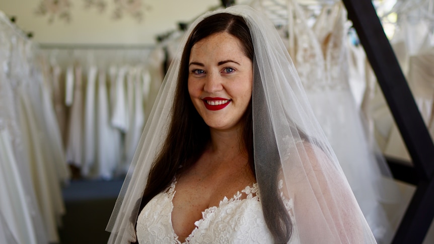 Hayley Harris is an ADHD bride trying on a wedding dress at the bridal shop English Rose Bridal in Perth