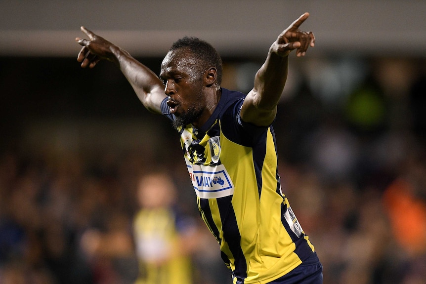 Usain Bolt celebrates a goal for Central Coast Mariners