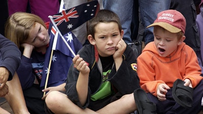 Bored children at the Brisbane Anzac Day parade (Getty Images)