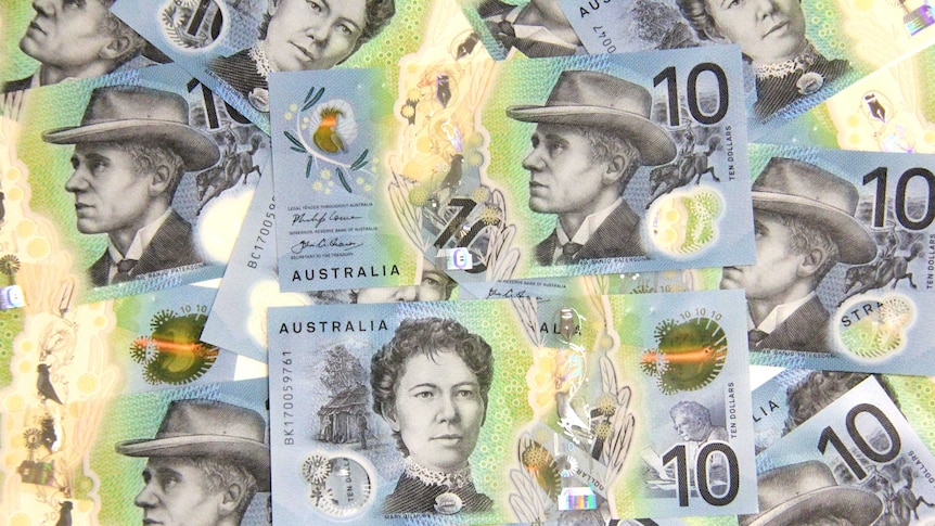 Scattered $10 banknotes