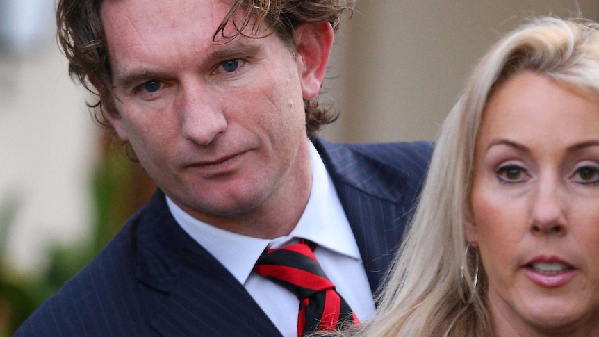Essendon coach James Hird and his wife Tania pictures outside their home in 2013.