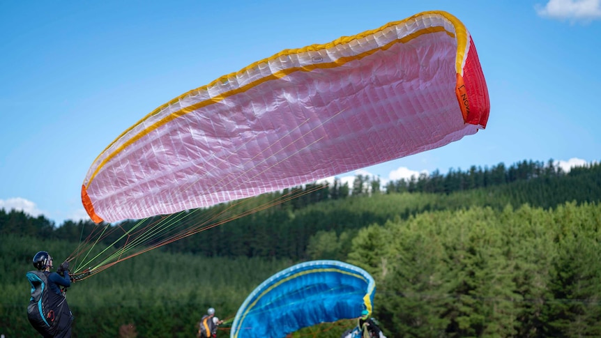 Paragliders about to take off