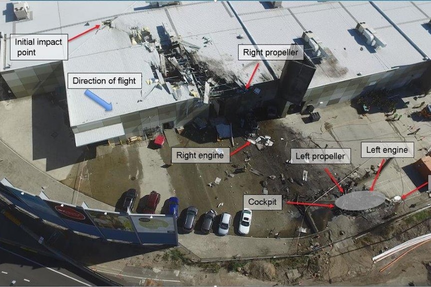 An overview of the crash site after a plane smashed into the DFO shopping centre at Essendon.