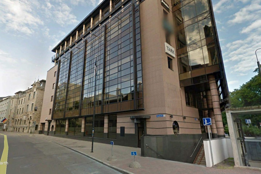 A Google Street View picture of a brown office building.