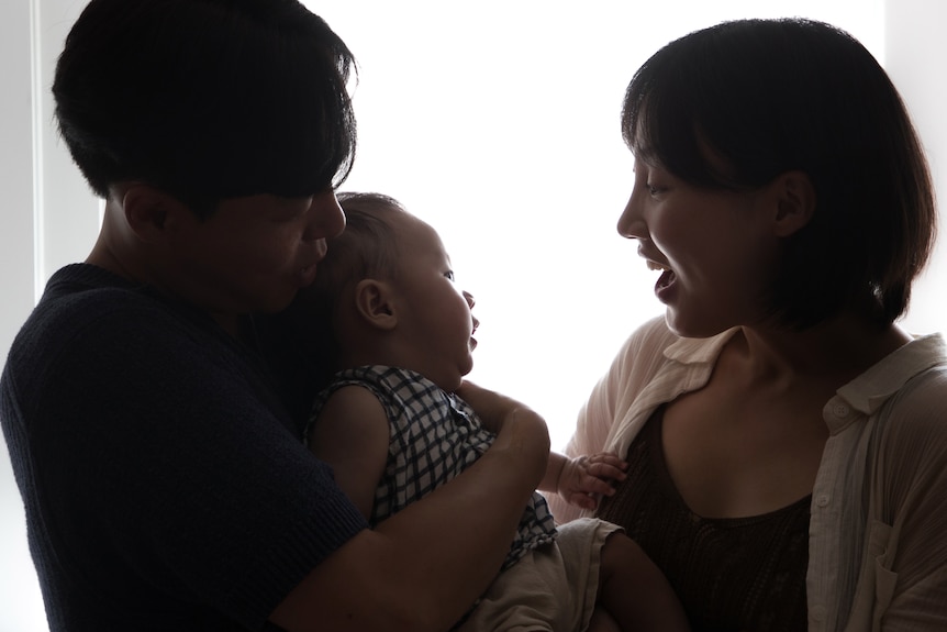 Yim Ji-sun with her family. They are in shadows