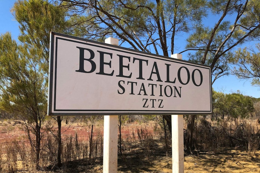 A sign by a rural road reads 'Beetaloo Station ZTZ'.