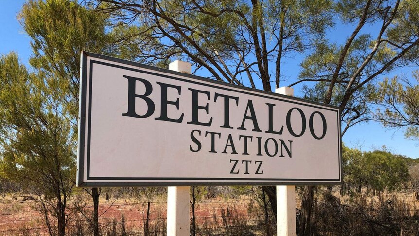 A sign by a rural road reads 'Beetaloo Station ZTZ'.