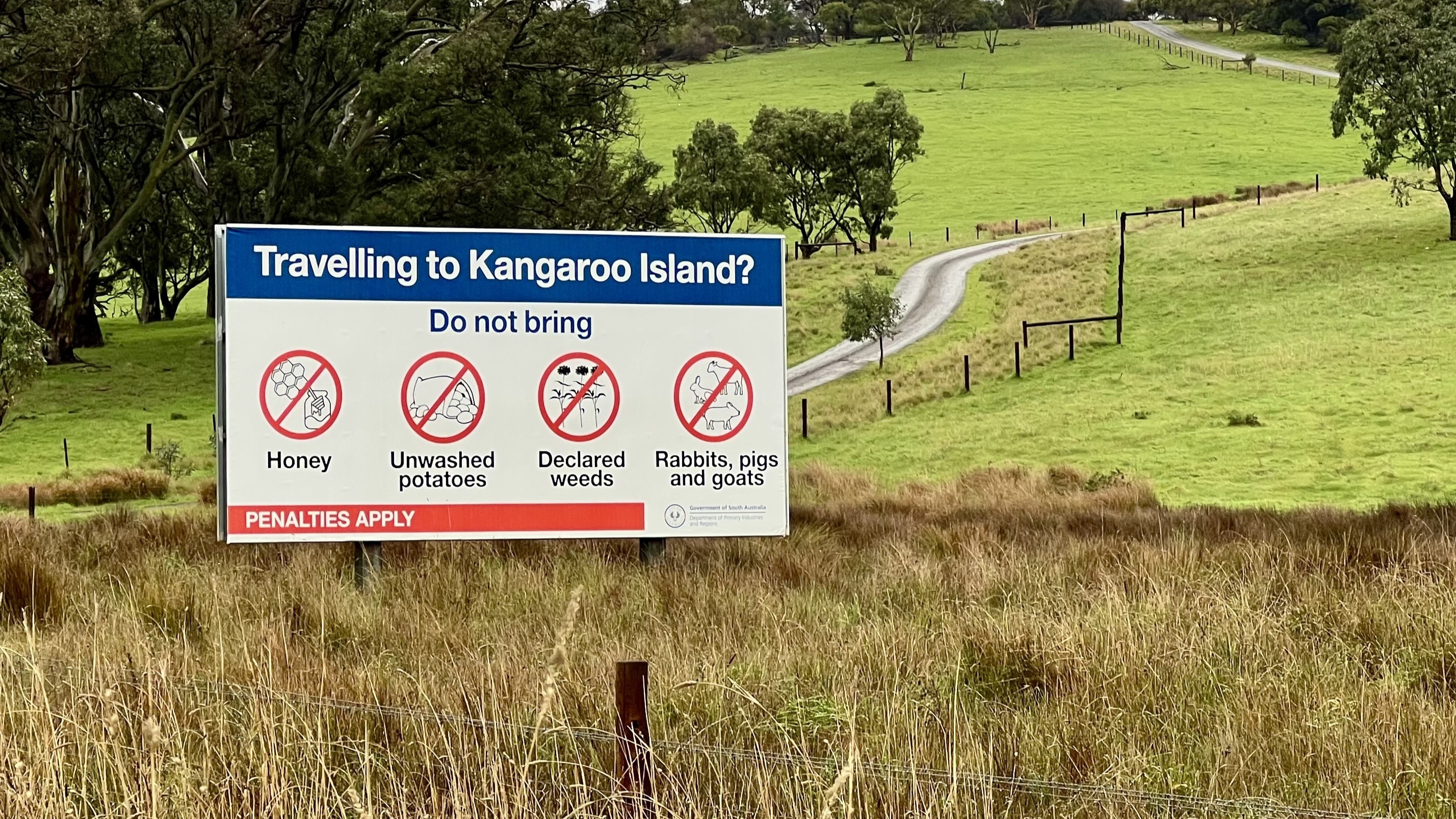 A sign advising that travellers cannot bring rabbits, pigs, goats, honey, unwashed potatoes or declared weeds to Kangaroo Island