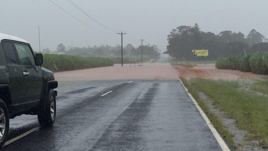 Roads are closing across Bundaberg as heavy rain buckets the region