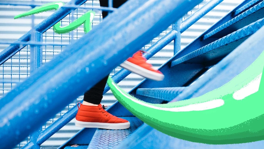Close-up of red shoes running up a set of blue stairs to depict the benefits of short bursts of exercise vs longer sessions.