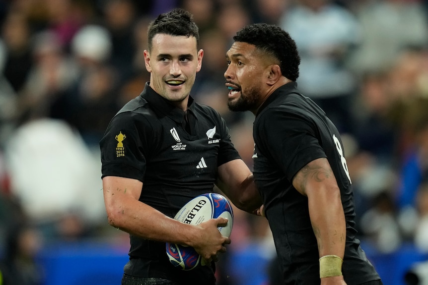 Will Jordan smiles with Ardie Savea