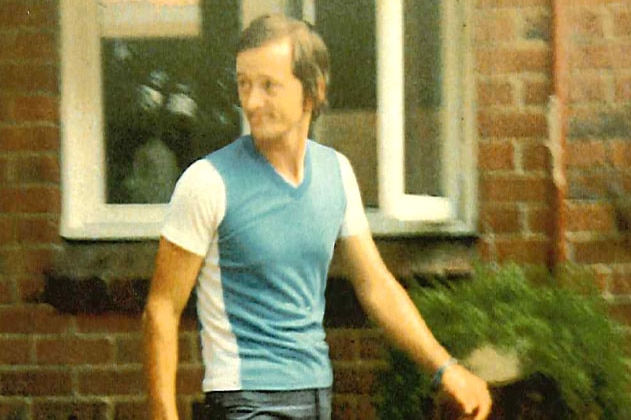 A dated photograph of a young man wearing 1970s fashion