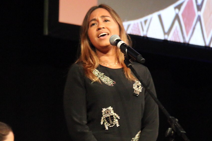 Singer Jessica Mauboy performs a song at the funeral of musician Dr G Yunupingu.