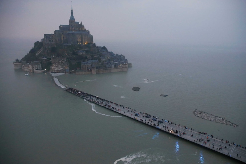 Mont SaintMichel in northern France transformed by supertide ABC News