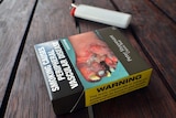 Cigarette packet and lighter