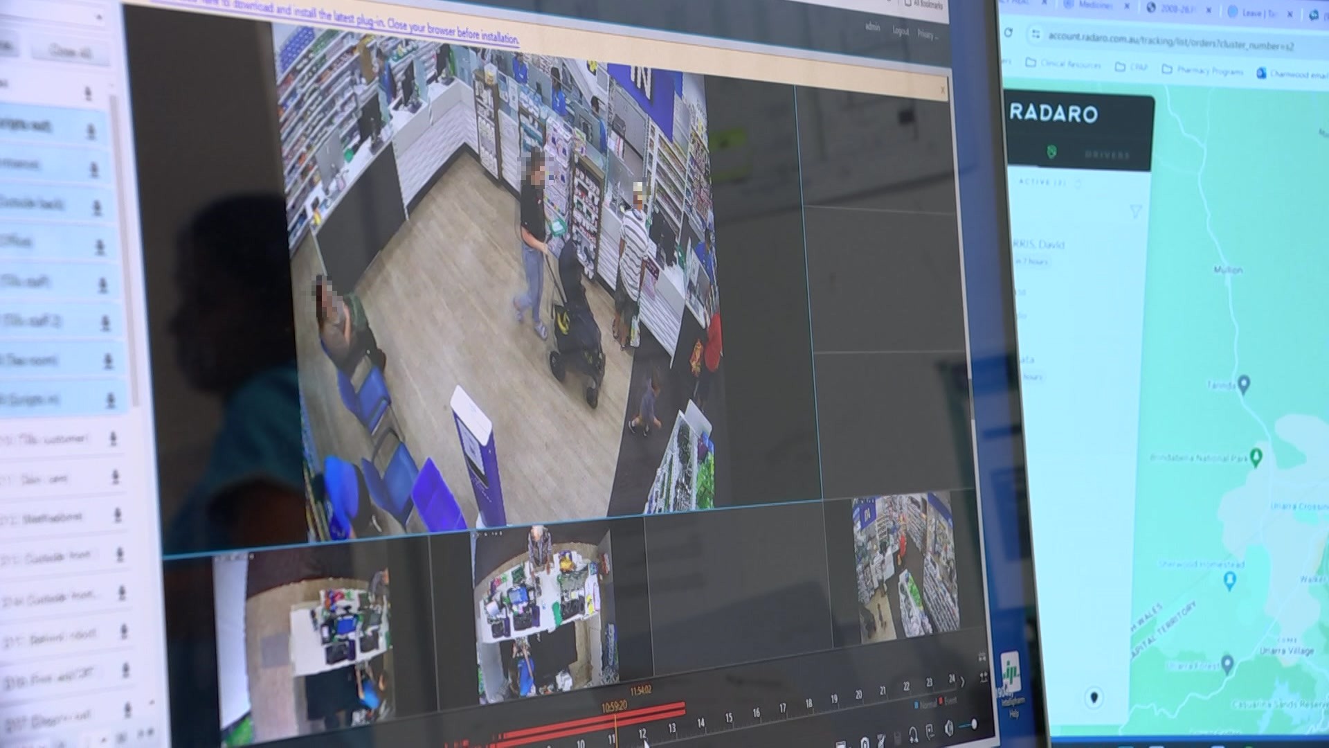 A computer screen showing a live feed of four CCTV cameras in a supermarket.