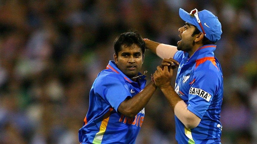 On song ... Vinay Kumar celebrates taking an Australian wicket (Getty images: Robert Prezioso)