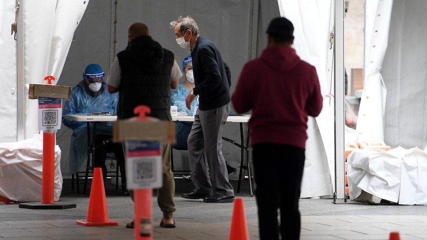 People queue for a covid test