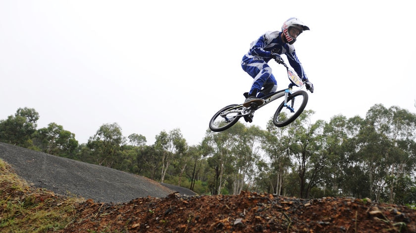 Australian BMX rider Luke Madill leaps through the air at his practice track in Penrith