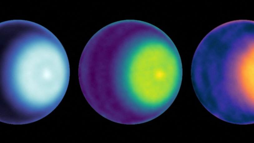 Three planets next to each other with highlighted areas in blue, green and orange. 