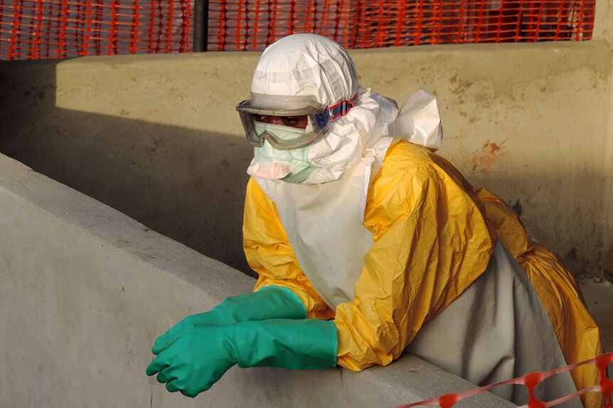 A volunteer, Sheku, awaiting decontamination for Ebola in Sierra Leone