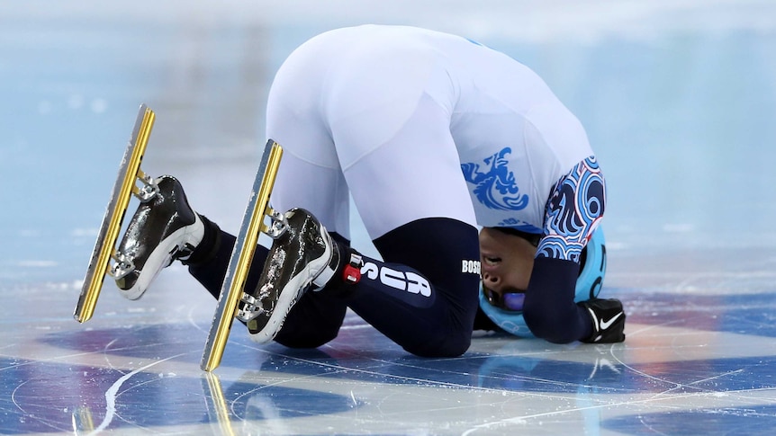 Victor An celebrates his gold medal win in the 1000m speed skating