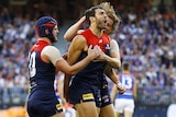 Christian Petracca kicks a goal