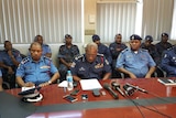 Police Commissioner Gari Baki (centre) surrounded by senior police officers. 