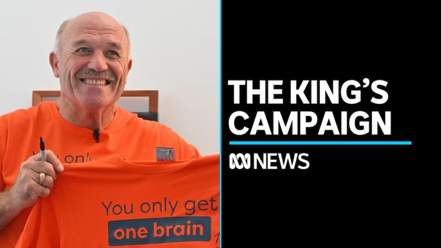 The King's Campaign: A smiling Wally Lewis holds up a t-shirt which reads 'You only get one brain'