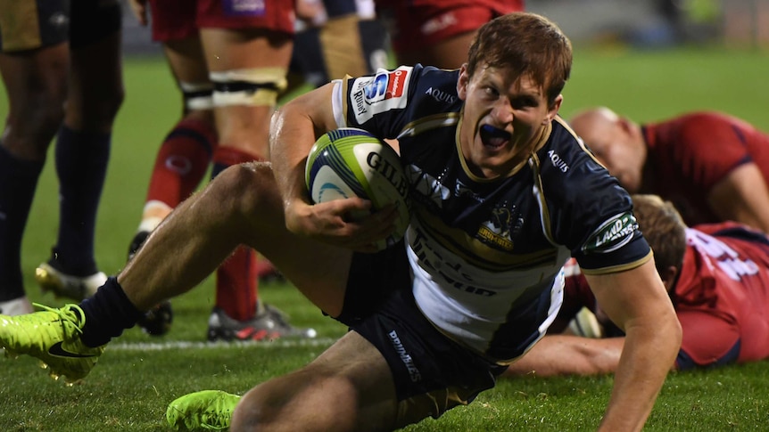 James Dargaville is all smiles after scoring for the Brumbies against the Reds.