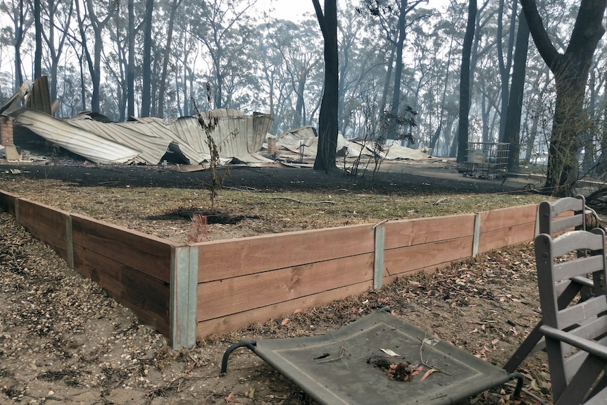 lawn and burnt home.