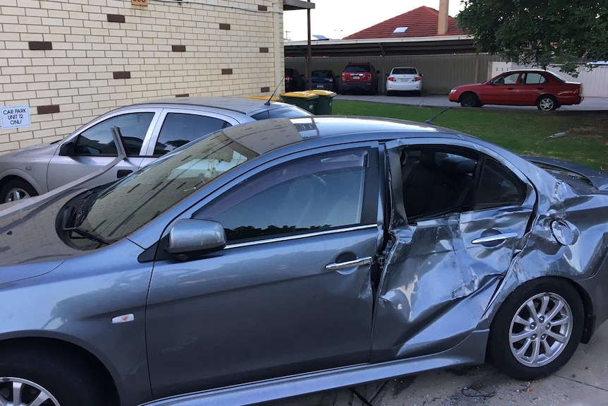 A damaged parked car