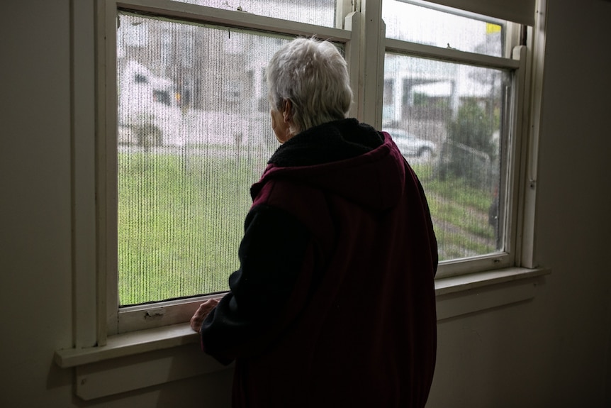 Cheryl looks out the window.