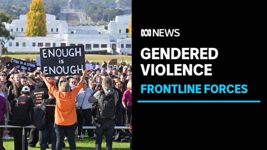 Gendered Violence, Frontline Forces: A woman holds a sign saying 'Enough is Enough' in front of a protest rally.