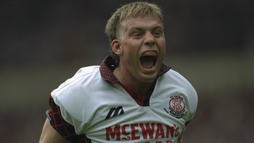 A male British rugby league player screams out during a club match in 1997.
