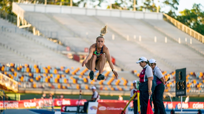 Brooke Stratton jumps into the long jump pit.