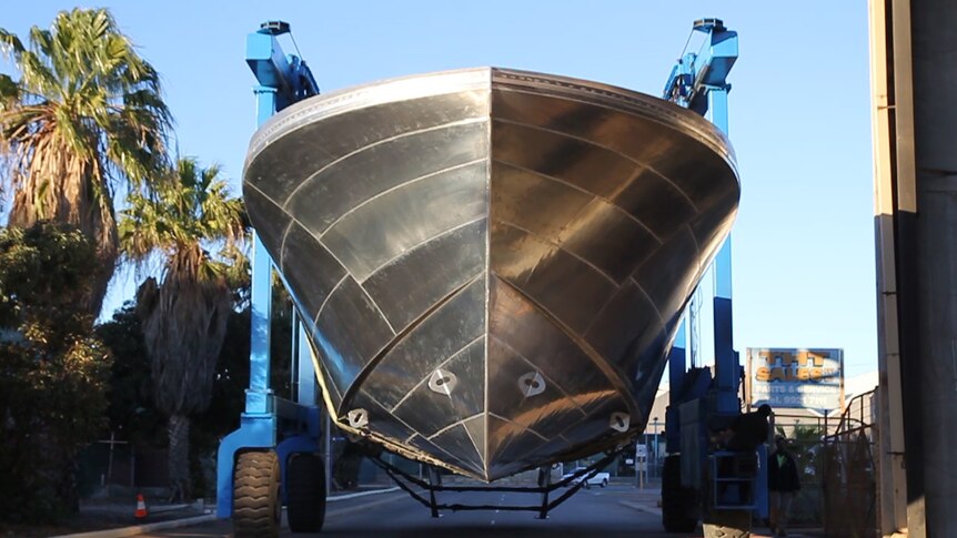 The hull for Australia's biggest rock lobster boat leaves its Geraldton workshop