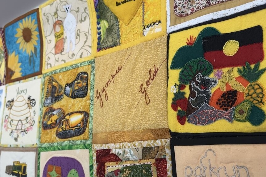 A number of yellow patches altogether in a quilt 