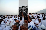 Muslim pilgrims pray on Mount Arafat.