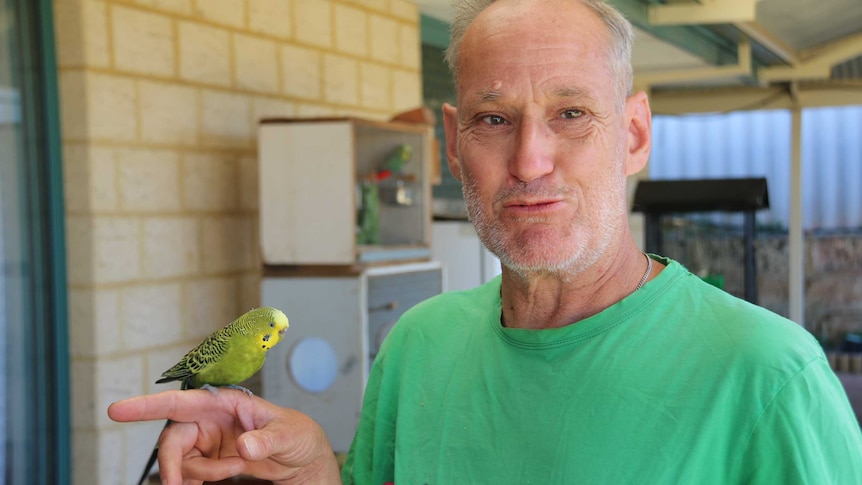 Gerard de Haas and his beloved birds at his Orelia home