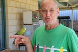 Gerard de Haas and his beloved birds at his Orelia home