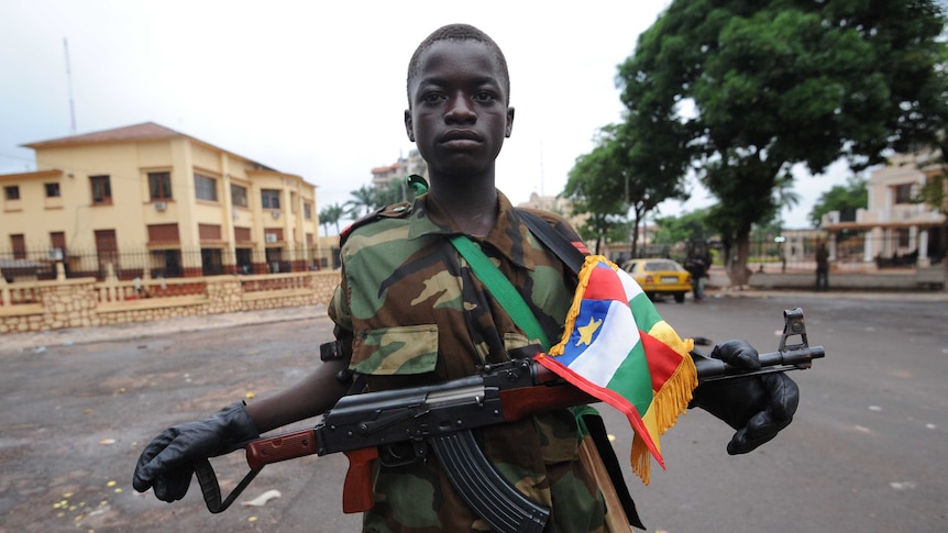 Solider stands outside presidential palace in Bangui