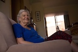 Jeanette Dyson sits in her living room at her home in the Kalgoorlie Masonic Village.