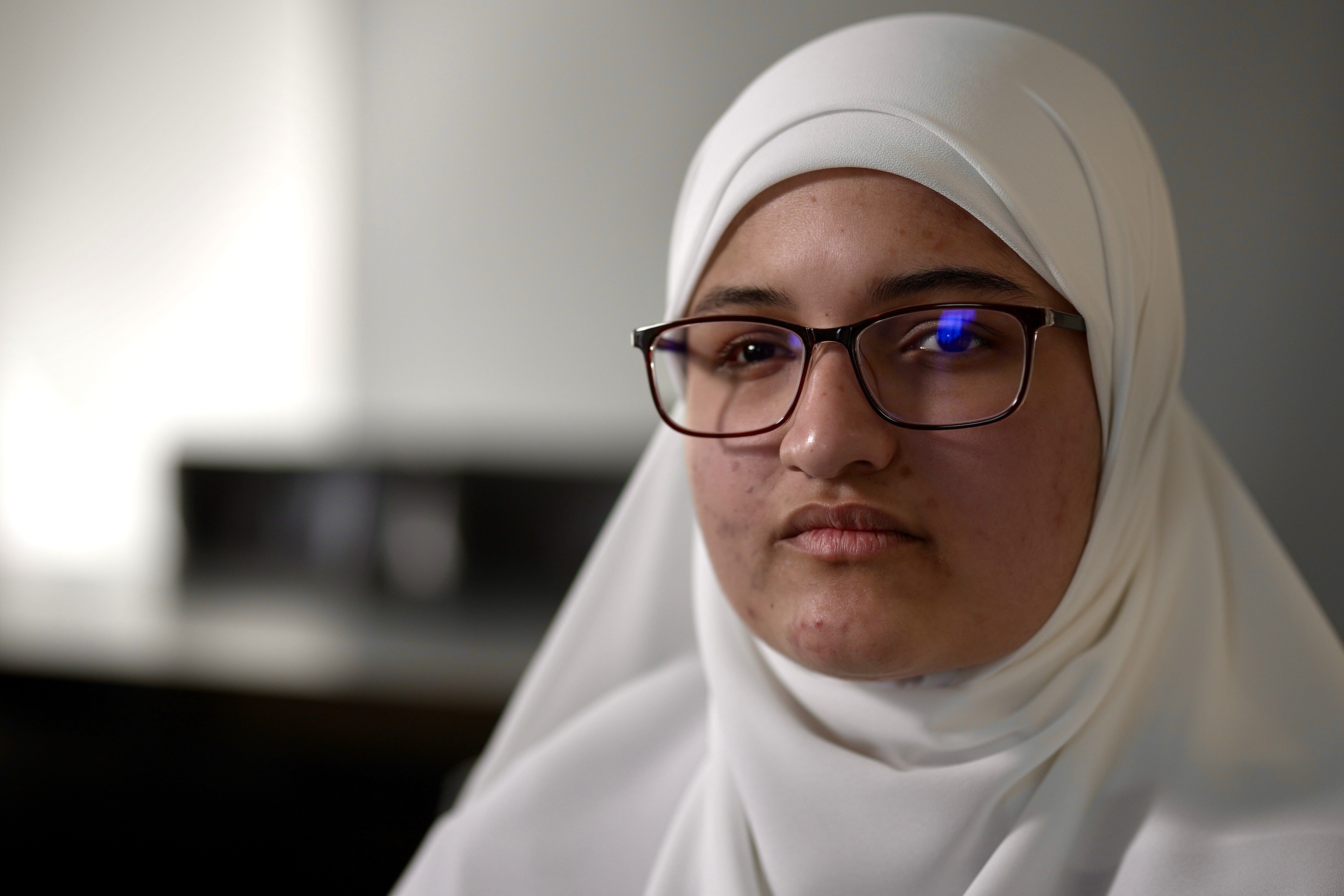 Raneem Abu Izneid looks at the camera seriously.